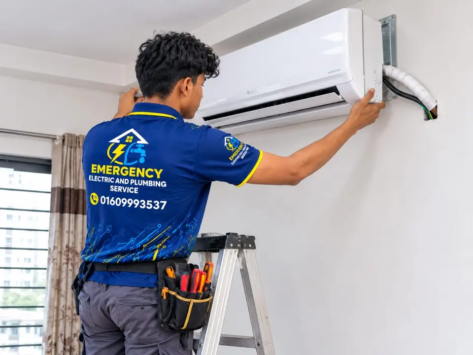 Technician installing an AC indoor unit