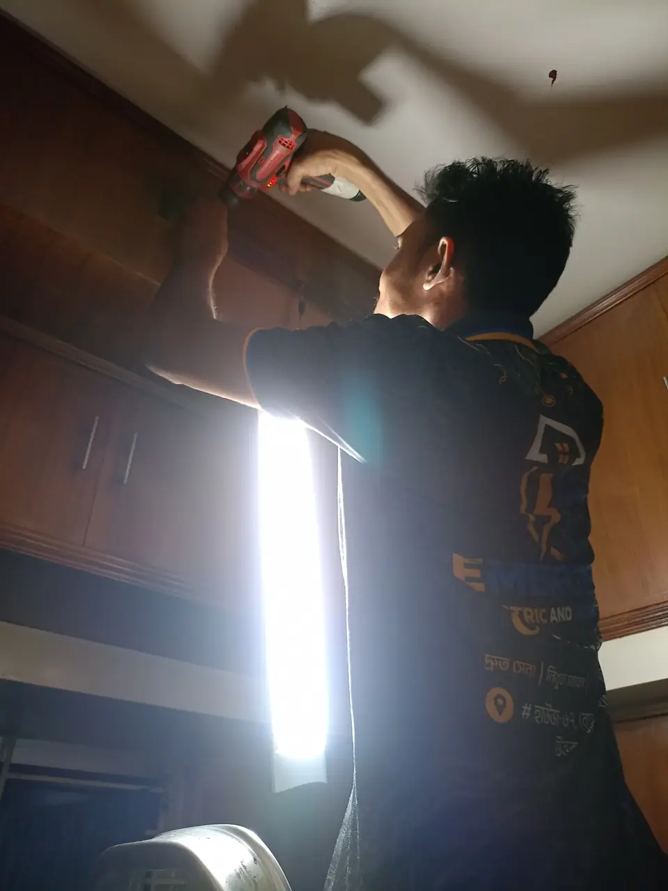 Drilling into a wall to mount a fitting