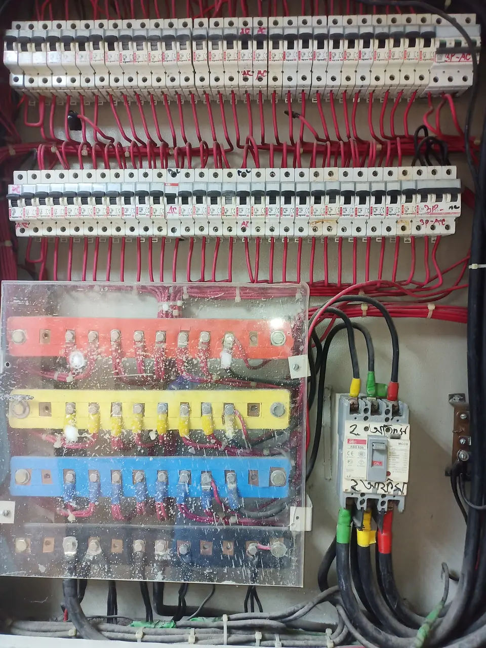 Neatly dressed busbars and breakers in a distribution board